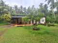 Road facing 120-Perches Land with House for Sale in Weliveriya.